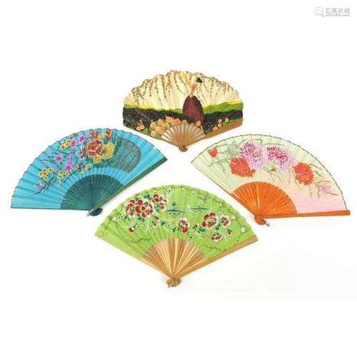 Four Art Deco fans decorated with figures and flowers, the l...