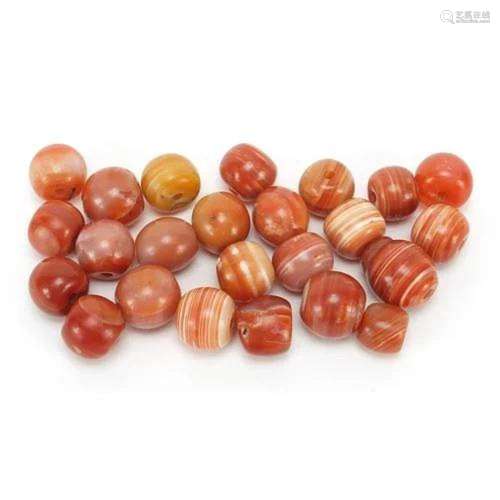 Group of Islamic agate beads, each approximately 2cm in diam...