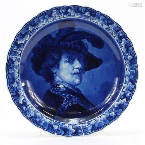 Large Delft charger decorated with a portrait of Rembrandt, ...