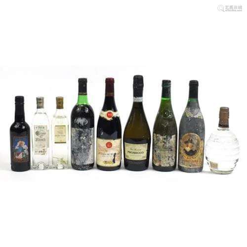 Nine bottles of alcohol including Cotes du Rhone red wine