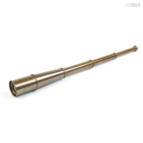 Brass three draw telescope, 27cm in length when closed