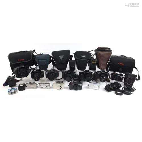Collection of cameras and accessories including Canon EOS 10...
