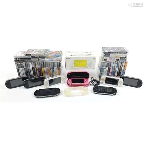 Seven PSP hand held games consoles, PS Vita and a large coll...