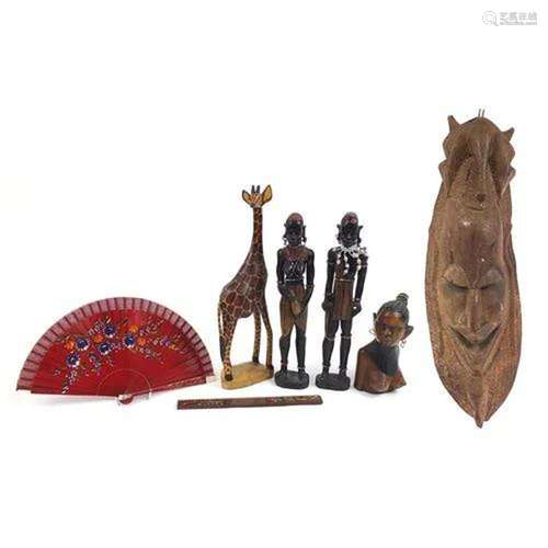 African and tribal wood carvings including a large wall mask...