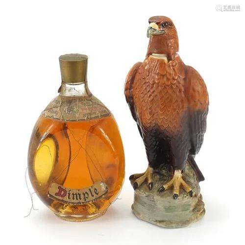 Bottle of Haig Dimple Scotch whiskey and a Beswick Golden Ea...