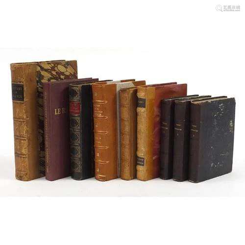 Nine antique and later hardback books, some leather bound in...