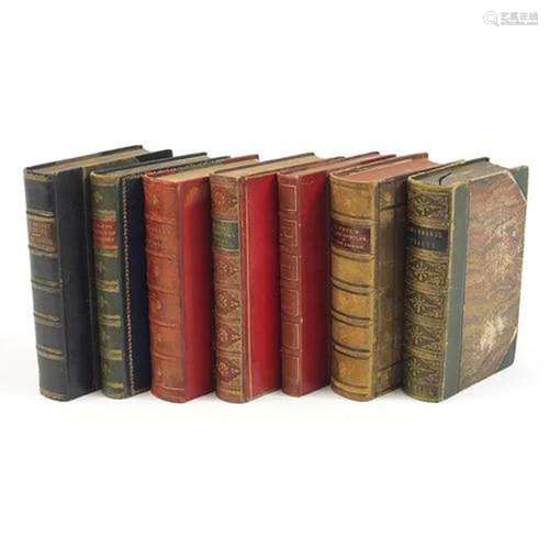 Seven antique and later hardback books, some leather bound i...