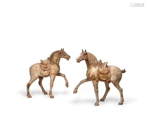 A PAIR OF PAINTED GREY POTTERY HORSES Tang dynasty