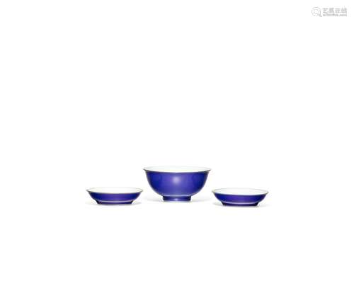 A PAIR OF SMALL COBALT BLUE GLAZED DISHES, AND A COBALT BLUE...