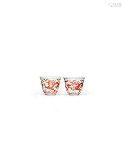 A PAIR OF IRON-RED-DECORATED 'DRAGON' CUPS Daoguang ...