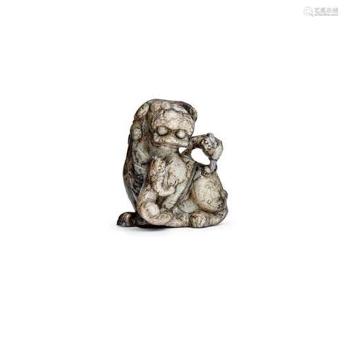 A BLACK AND GRAY JADE 'LION AND CUBS' VESSEL Ming Dy...