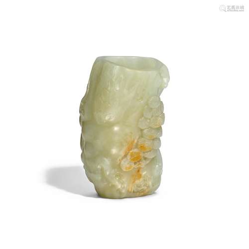 A RUSSET AND CELADON JADE 'PINE' VESSEL Qing Dynasty...