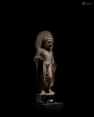 A SCHIST FIGURE OF BUDDHA ANCIENT REGION OF GANDHARA, 3RD/4T...