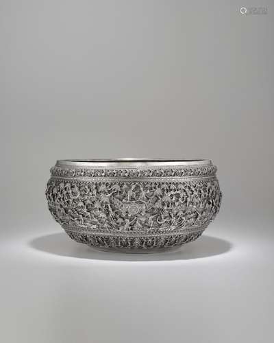 A LARGE SILVER OFFERING BOWL WITH SCENES FROM THE RAMAYANA L...