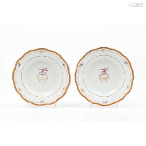 A pair of scalloped soup plates