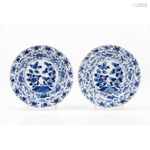 A pair of scalloped plates