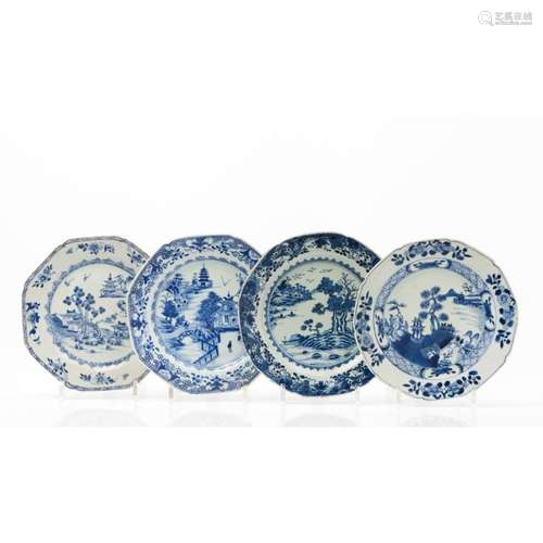 A set of 4 scalloped plates