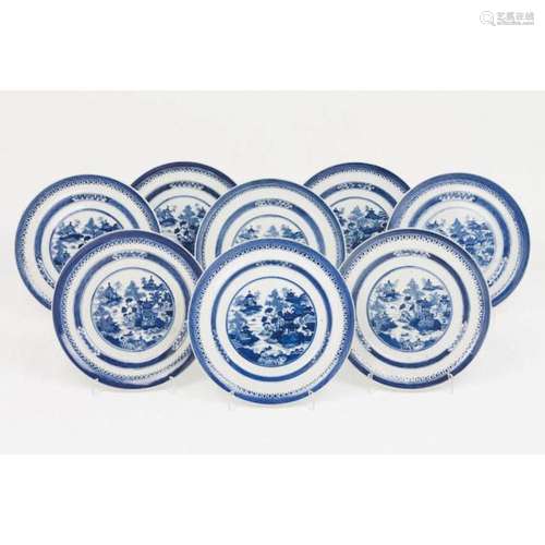 A set of eight plates