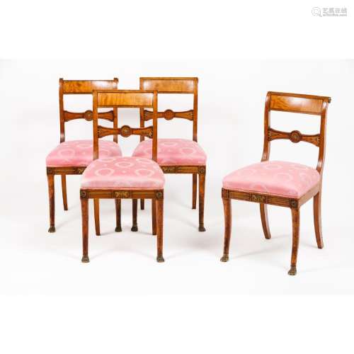 A set of four Empire taste chairs