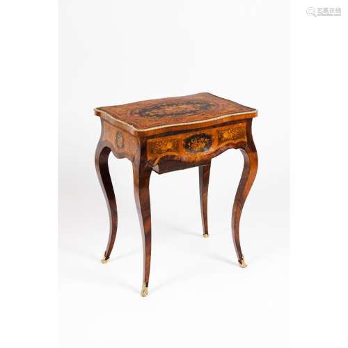 A Napoleon III work table in the Louis XV style