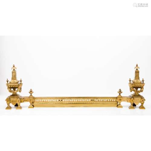 A pair of Louis XVI style fire dogs and central bar