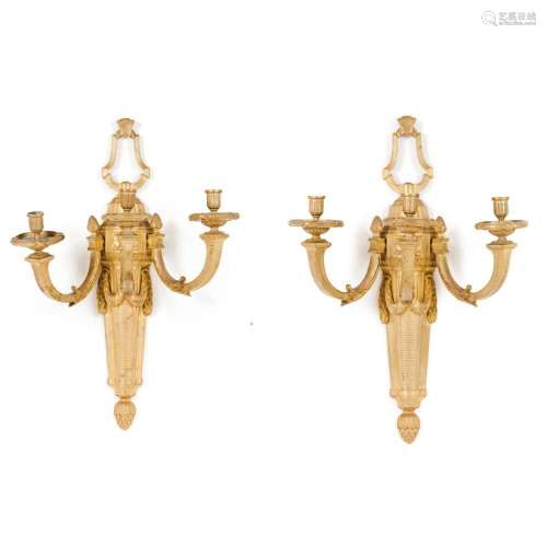 A pair of large Louis XVI style wall sconces