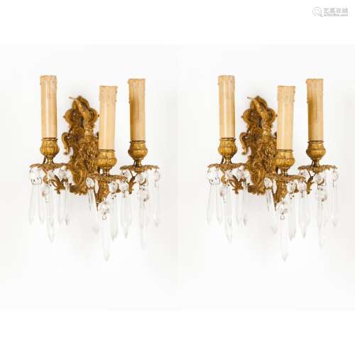 A pair of Napoleon III three branch wall sconces