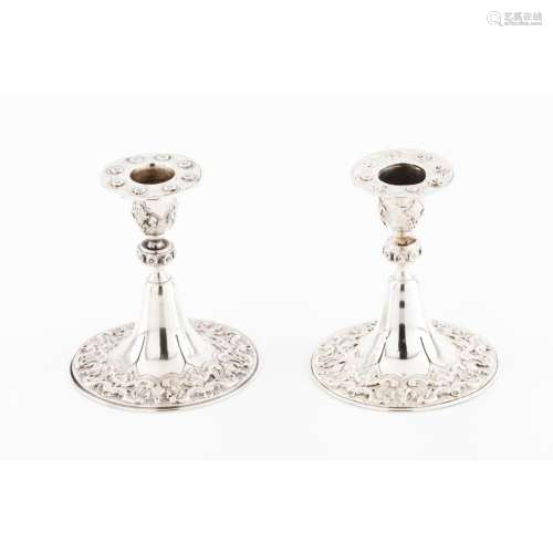 A pair of low candle sticks