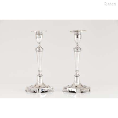 A pair of neoclassical candle sticks