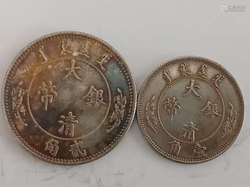 TWO CHINESE OLD SILVER COINS