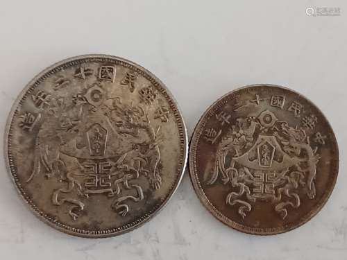 TWO CHINESE OLD SILVER COINS