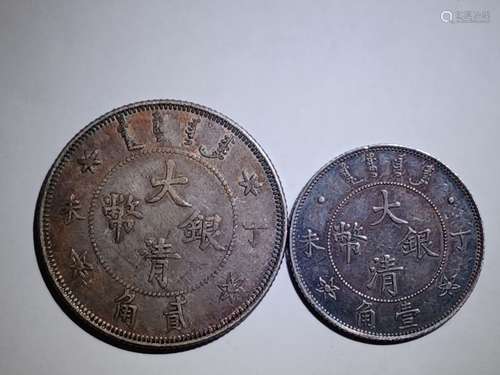 TWO CHINESE OLD SILVER COINS