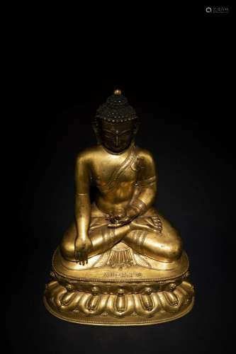 Xuande, Ming Dynasty: A Gilt Bronze Sakyamuni Buddha Statue