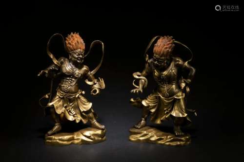 Ming Dynasty: A Pair of Gilt Bronze Dharma Protectors Statue...