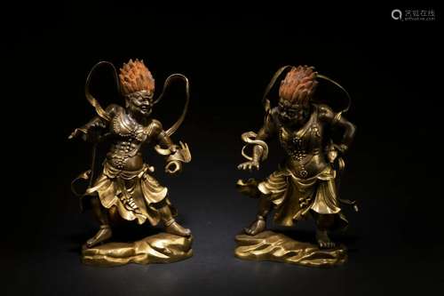 Ming Dynasty: A Pair of Gilt Bronze Dharma Protectors Statue...