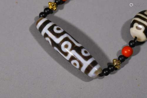 A group of Dzi beads