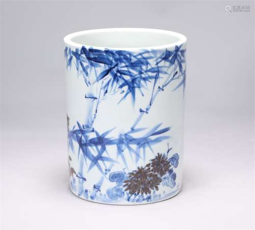 The red bamboo penholder in the blue and white glaze of Kang...