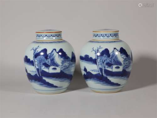 A pair of blue and white landscape cans in Qianlong in the Q...