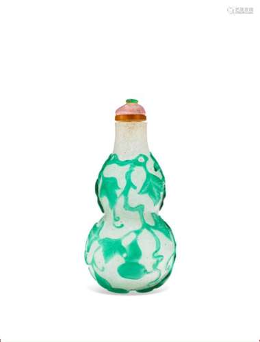 A GREEN-OVERLAY 'SNOWSTORM' GLASS DOUBLE-GOURD-SHAPED SNUFF ...