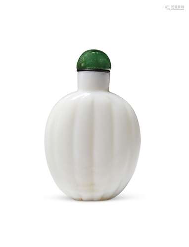 A CARVED ARAGONITE SNUFF BOTTLE