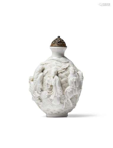 A WHITE-GLAZED MOLDED PORCELAIN SNUFF BOTTLE