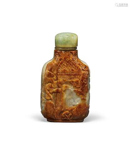 A CARVED CELADON AND RUSSET JADE SNUFF BOTTLE