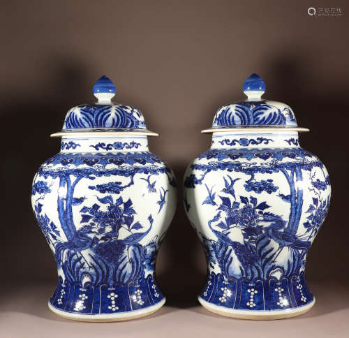 A pair of blue and white flower and bird general cans in Kan...