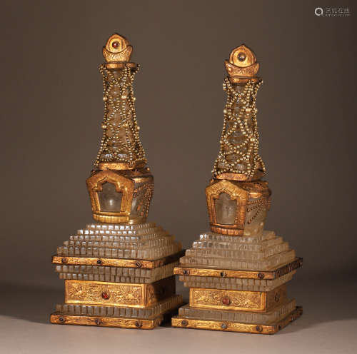 A pair of crystal gold clad relic towers
