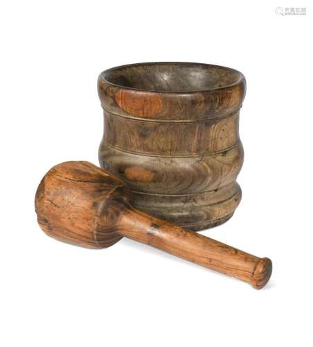 A turned lignum vitae pestle and mortar, late 18th or early ...