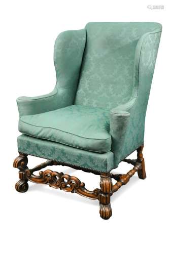A William & Mary style wingback armchair, 19th century,