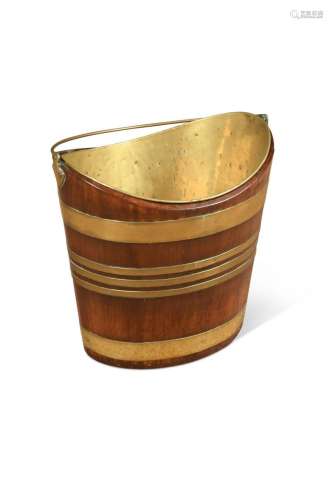 A George III mahogany and brass peat bucket,