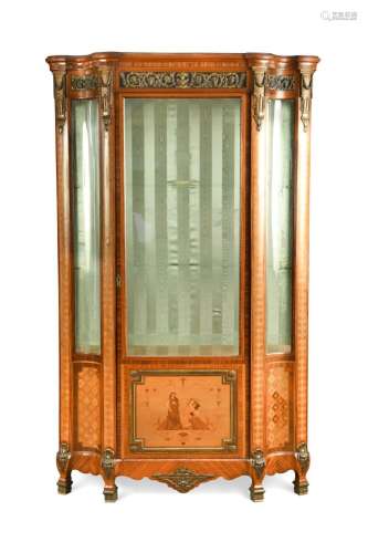 A Continental gilt mounted and marquetry vitrine of shaped o...