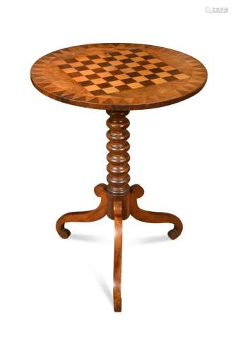 A Victorian walnut and inlaid circular games table,