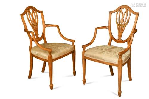 A pair of Sheraton style satinwood shield back elbow chairs,
